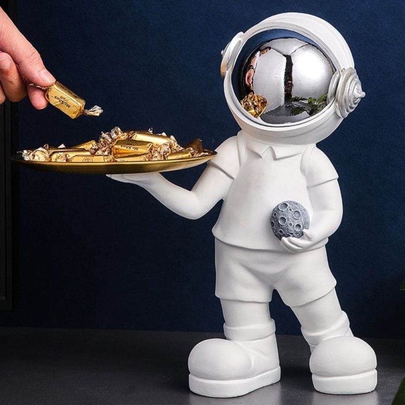 vide poches statue astronaute