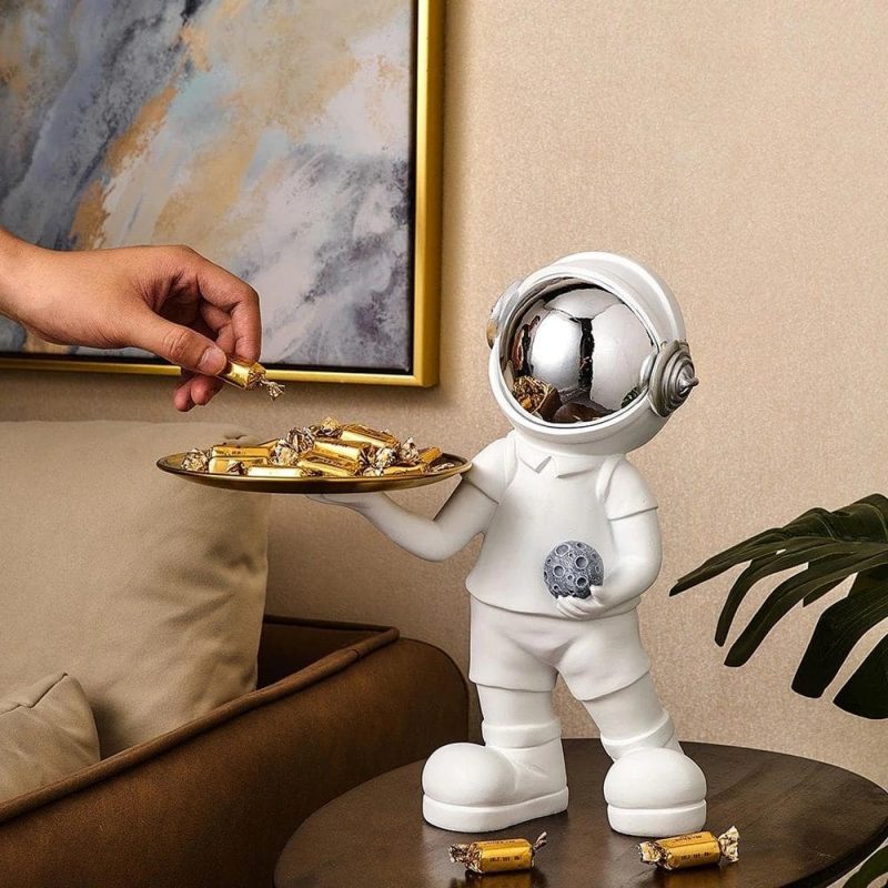 vide poches statuette astronaute